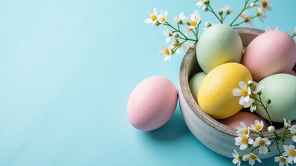 Easter Eggs and Spring Flowers on Blue Background