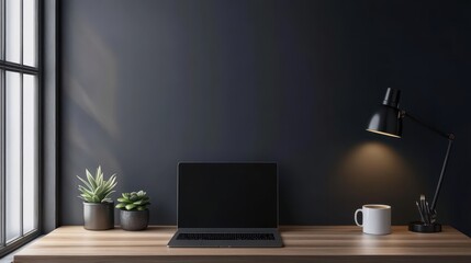 Laptop and succulents frame blank sign on sleek charcoal wall