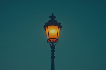 Illuminated vintage street lamp against a twilight sky.