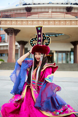 Naklejka premium Mongolian girl wearing traditional costume of Mongolian Bryat tribe