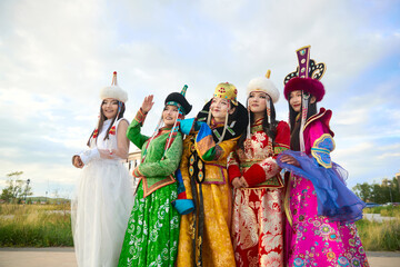 Fototapeta premium Mongolian girls wearing traditional costumes of various Mongolian tribes