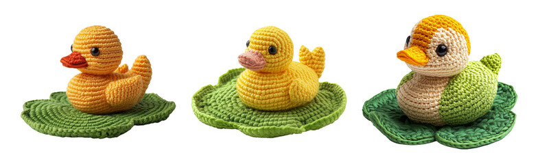Obraz premium Cute Crochet Ducklings on Leafy Pads Isolated on Transparent Background