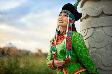 Fototapeta premium Mongolian girl wearing traditional costumes of the Barhu tribe