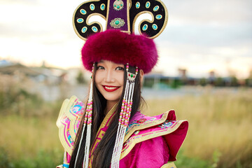 Mongolian girl wearing traditional costume of Mongolian Bryat tribe