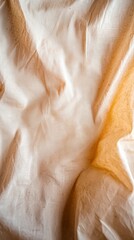 Obraz premium Beige Fabric Texture Wrinkled Draped Pastel Background