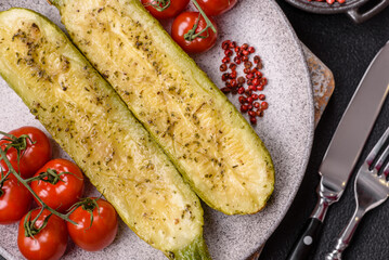 Delicious zucchini cut into two halves baked with salt, spices and herbs