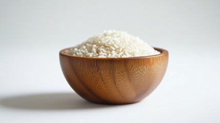 Delicate Display of White Rice in a Wooden Bowl: Simple and Healthy Food Presentation