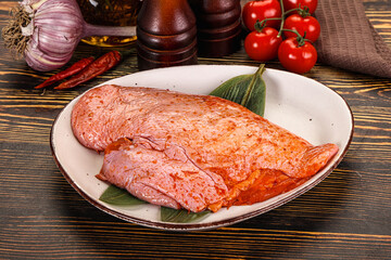 Raw marinated duck breast for cooking