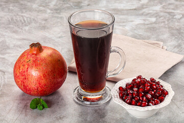 Sweet fresh pomegranate juice with fruit