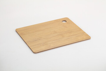 Wooden cutting board isolated on white background