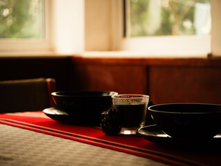 Dinner table for two set with crockery