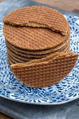 Traditional Dutch sweet dessert, Butter caramel syrup waffles, fresh baked