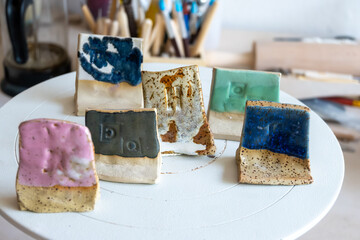 Samples of ceramic art objects and tabelware during workshop in art ceramic atelier in Poland
