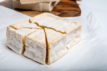 French squared pont l'eveque cow cheese from Calvados department, Normandy, France
