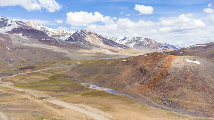 An aerial view of beautiful himalayan mountains in the evening at baralacha pass, leh manali highway lahul, himachal pradesh, India.