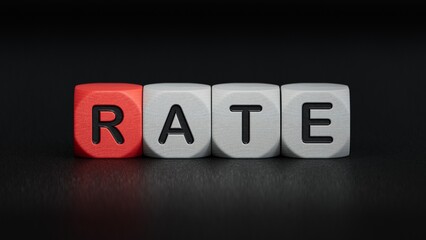 rate Word Written In Wooden Cubes on notebook with pen.close up of wooden elements,Business Concept.3D rendering on black background.