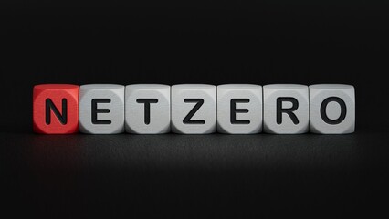 Reduce CO2 emissions, limit climate change, global warming, net zero carbon dioxide reduction concept. Green Net Zero icon, text on small wooden cube block.3D rendering on black background.