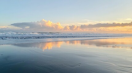 The ocean is calm and the sky is a beautiful orange color