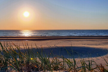 Naklejka premium sunset on the beach in the netherlands