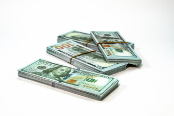 Stacked Dollar Banknotes on a Clean White Background