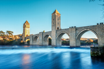 The 14th and 15th century Valentré bridge, a UNESCO World Heritage Site, crossing the River Lot in the town of Cahors in France