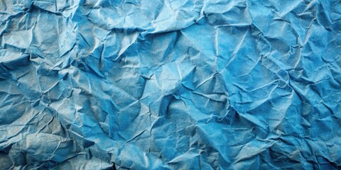 Fototapeta premium A Wrinkled Blue Surface With Irregular Creases and Folds, Revealing a Deep and Textured Background