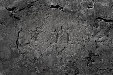 Texture of old gray concrete wall with plaster close-up