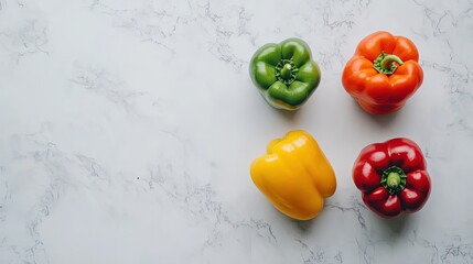 Three bell peppers of different colors green yellow