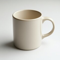 Fototapeta premium A clean, simple ceramic mug in a soft neutral tone, isolated on a plain white surface with plenty of space around it