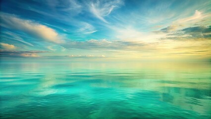 Obraz premium Serene Ocean Horizon Under a Sky of Whispy Clouds and Golden Light