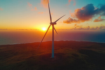 A majestic wind turbine stands tall against a vibrant sunset over the ocean, symbolizing clean energy.