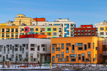 Modern apartment building with colorful facades on the outskirts of the city. Residential Complex 'In the forest', Moscow, Russia