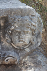 Medusa stone carving in the  Ancient Lycian  City of Myra Demre Turkey