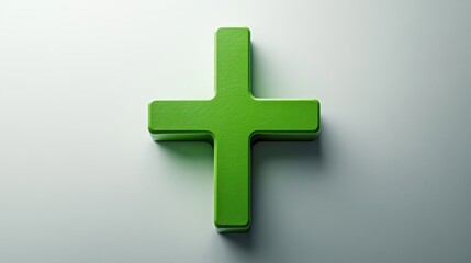 Obraz premium Bold green plus sign against a minimalistic gray background in a contemporary style design