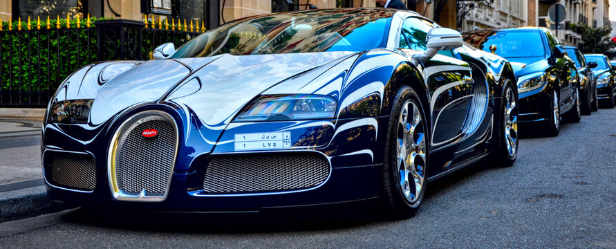 Paris, France - April 18th 2015 : Side view of the Bugatti Veyron "l'Or Blanc" (White gold). Created by Bugatti and the royal manufactury of porcelain of Berlin. There is only one car in the world.