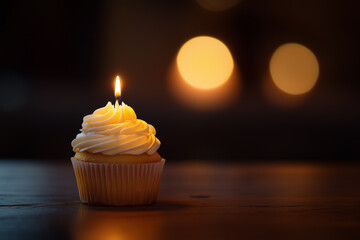 Colorful cupcake topped with a candle, ideal for birthday celebrations
