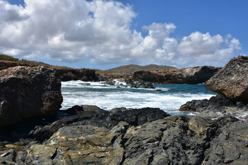 Black Sand Beach in Aruba with Crashing Waves