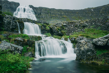 Dynjandi is one the most famous waterfall of the West Fjords of Iceland at summer