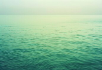 Obraz premium A smooth green-to-aqua gradient, offering a fresh and tranquil vibe