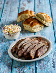 braised brisket served with coleslaw and slider rolls