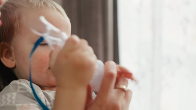 A child is joyfully enjoying their playtime using a colorful and engaging toy in the comfort of their home
