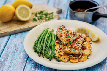 Trout Amandine with potatoes and asparagus