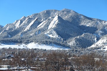 Green mountain, Flatirons, covered with fresh snow, Boulder, Colorado