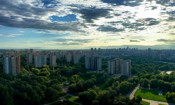green Airport city park on a sunny summer morning, panoramic view from high-angle perspective reveals a bustling metropolis surrounded by lush greenery, with gleaming skyscrapers