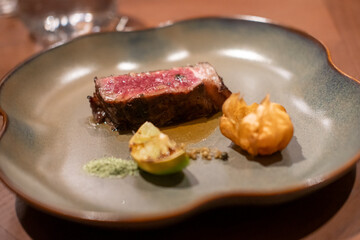 Medium rare Wagyu beef on plate