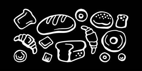 Various white bakery products on a black background