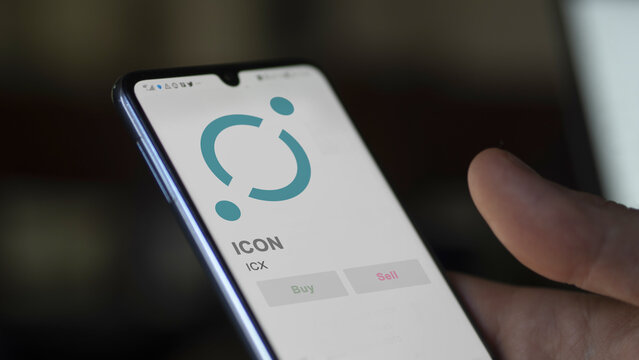 Close up on logo of (ICX) ICON crypto asset on the screen of an exchange. (ICX) ICON price stocks, $ICX on a device.