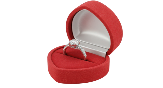 Sparkling Diamond Ring in Open Heart-Shaped Velvet Box on Clear Background.