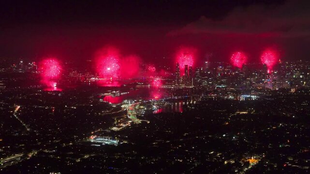 Aerial Drone view of Sydney Harbour Bridge NYE New Years Eve fireworks, colourful fire works lighting the night skies with vivid multi colours Sydney NSW Australia