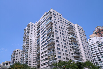 New York City apartment buildings, mid-20th century style, upper east side of Manhattan.